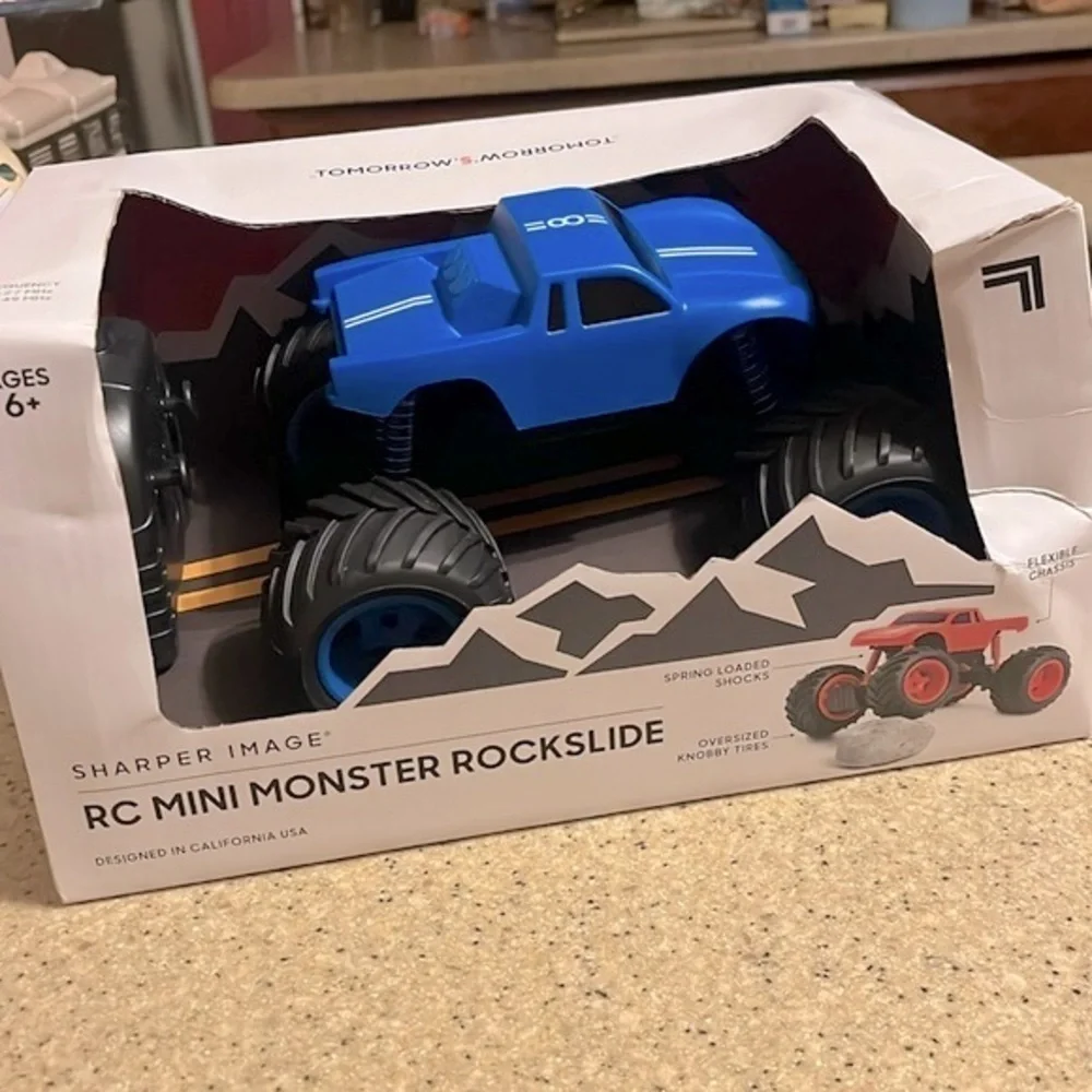 Brand New Sharper Image Remote Control Mini Monster Truck Rockslide Blue Toy